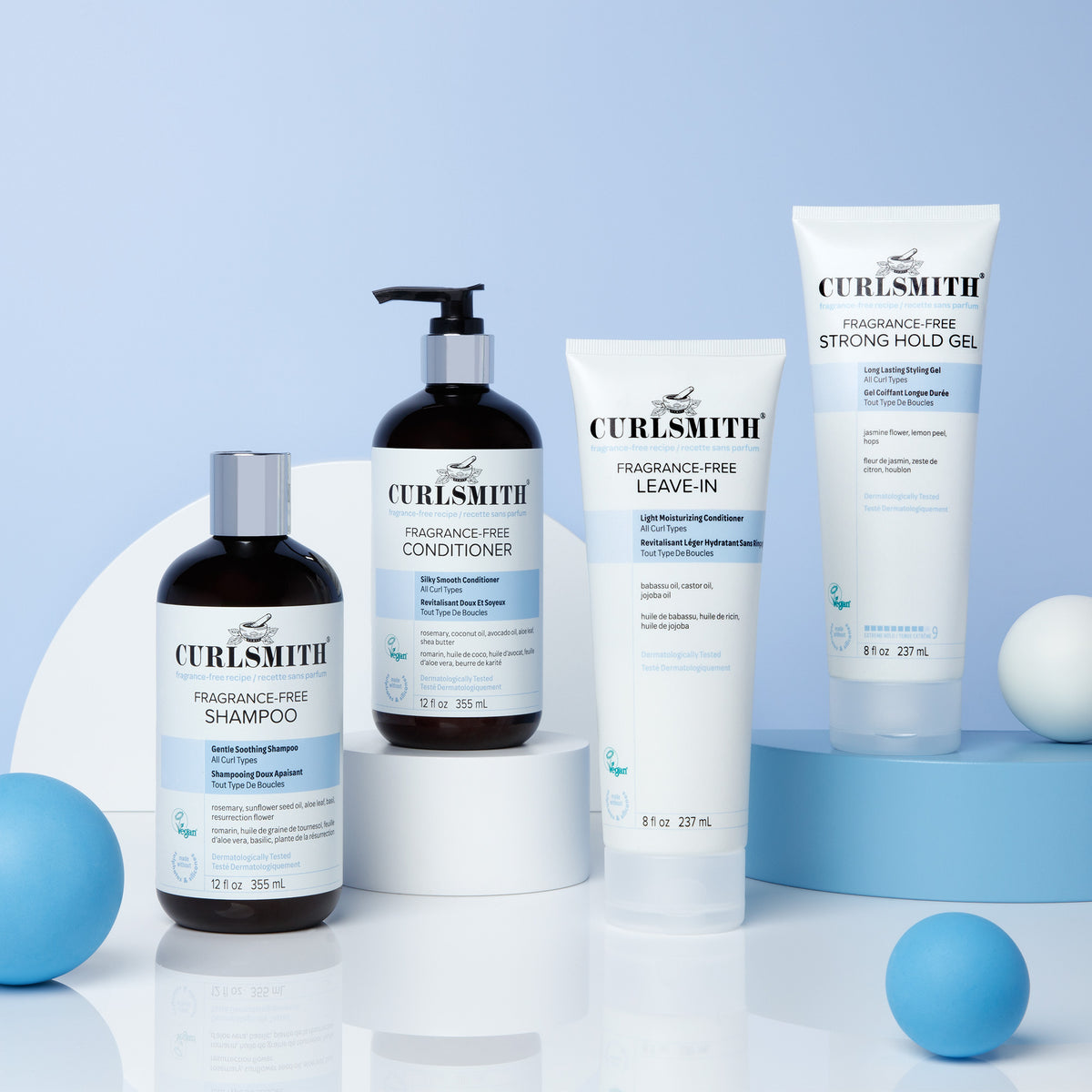 Curlsmith Fragrance-free hair care products on a light blue background