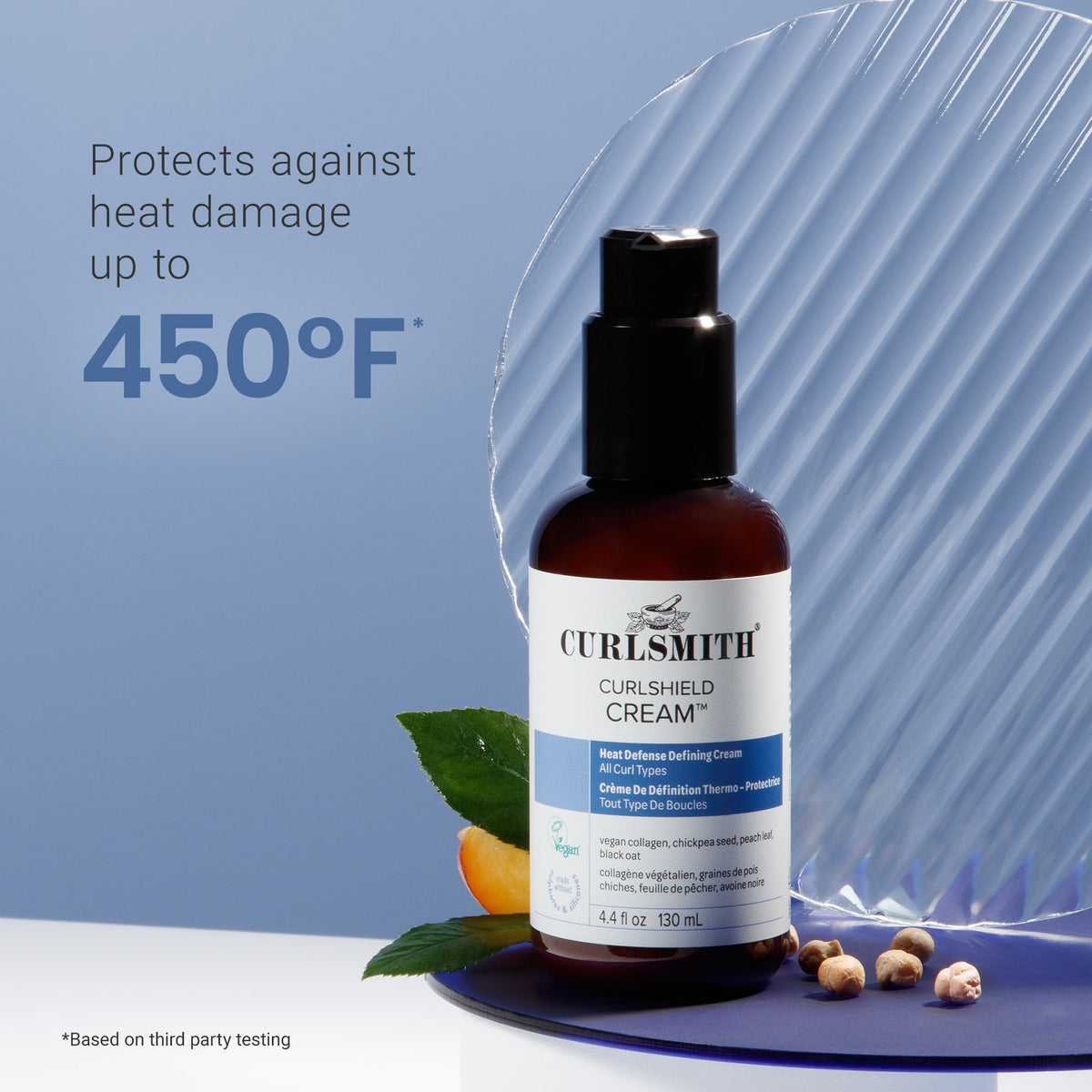 Curlsmith Curlshield Cream bottle with text on heat protection on a blue background