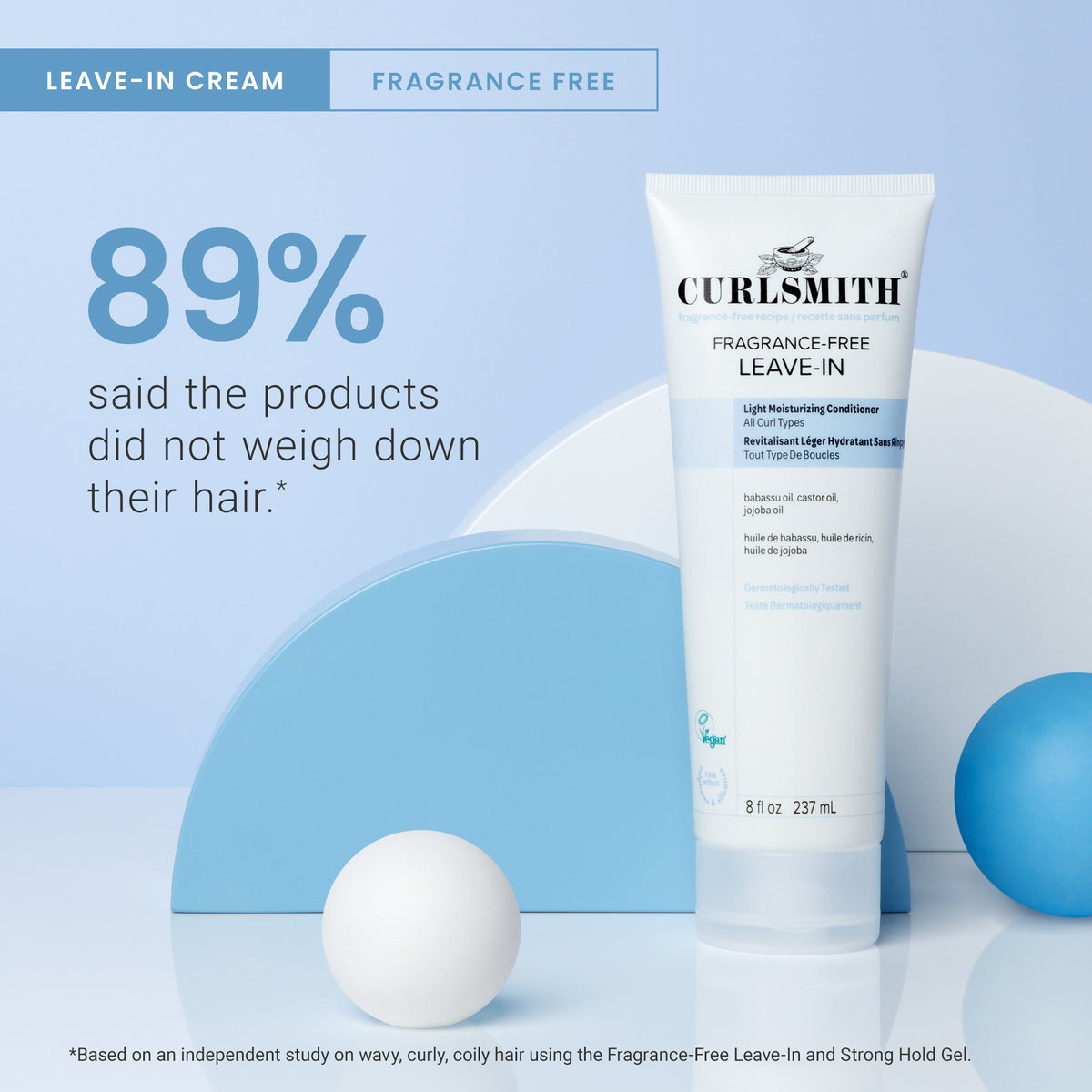 Curlsmith Fragrance-Free leave-in cream tube on a blue and white background with text about product effectiveness.