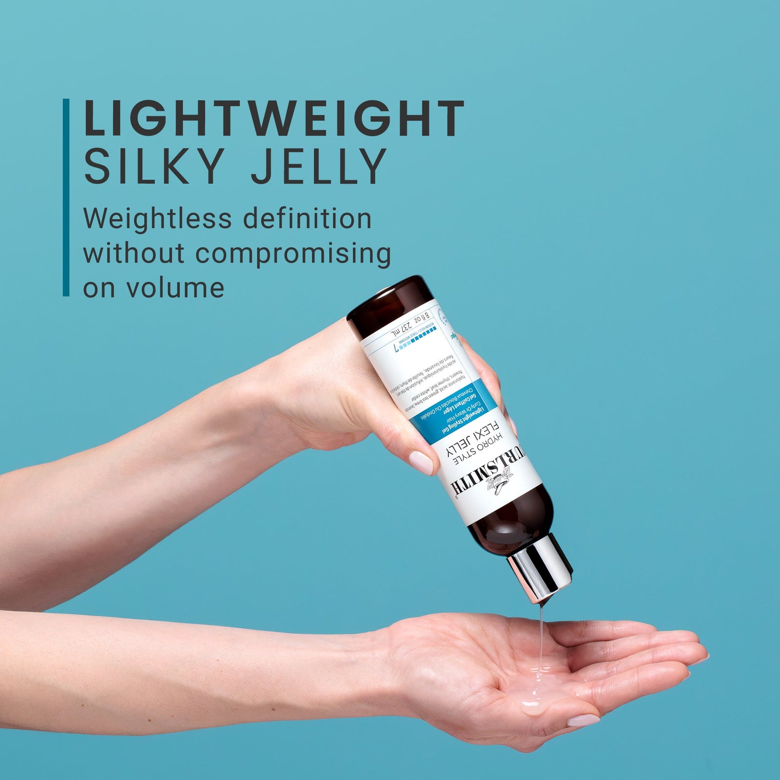Hand holding a bottle of Curlsmith Hydro Style Flexi Jelly hair product with text on a blue background