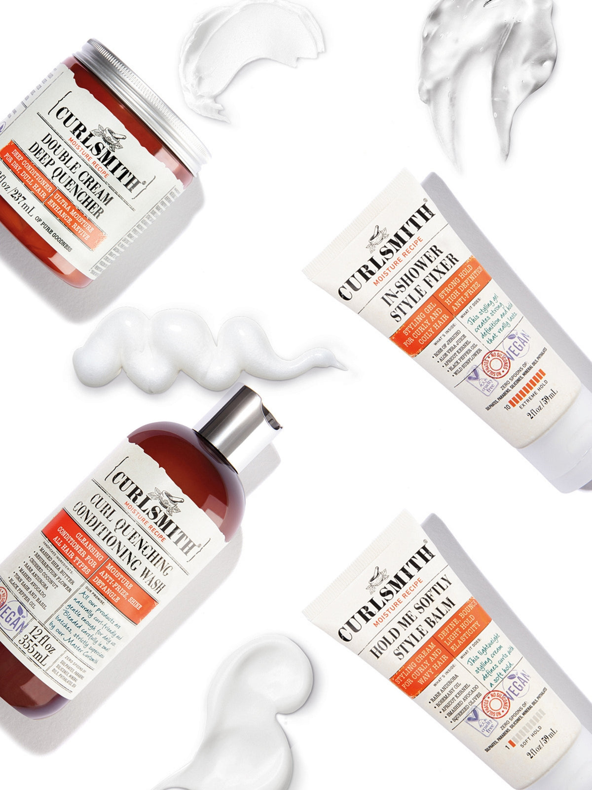 A collection of hair care products from Curlsmith, including bottles and tubes with creams