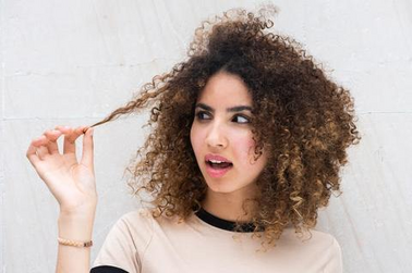 Oily Hair Guide: Signs, Causes, & Fixes