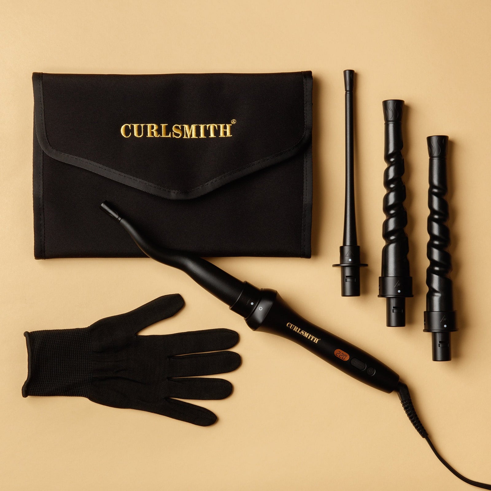 Curlsmith curling wand set with attachments and black glove on beige background, Click to enlarge