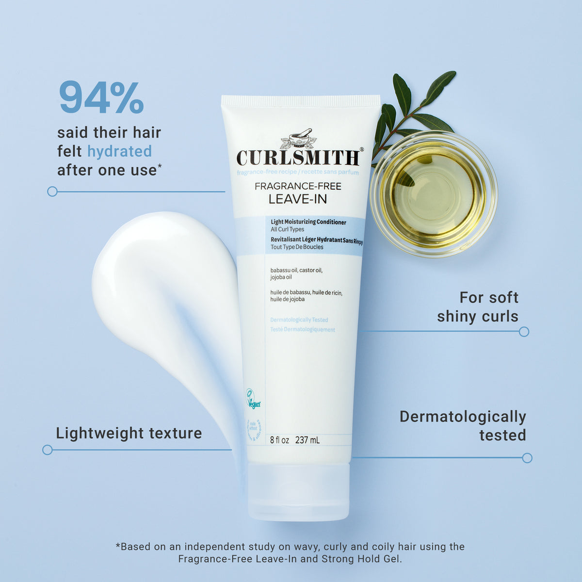 Curlsmith leave-in conditioner tube with olive oil jar on a light blue background, Click to enlarge