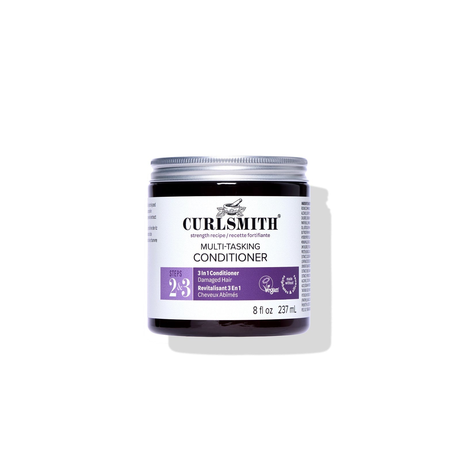 Jar of Curlsmith multi-tasking conditioner on a white background