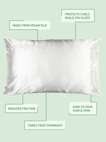A white satin pillowcase on a pillow, with a subtle sheen.