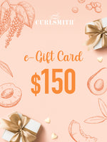 An e-Gift Card from Curlsmith featuring a $150 denomination, with decorative elements such as leaves and gift boxes in blue tones.